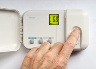 how to replace the batteries in a thermostat