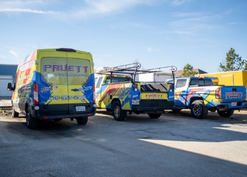 Pruett work vans and trucks lined up