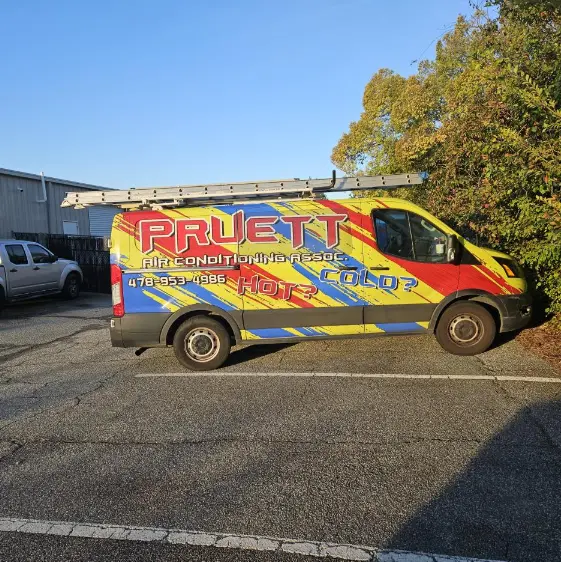 Pruett Air Conditioning service van parked in a lot Pruett Air Conditioning service van parked in a lot