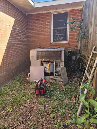 outdoor-carrier-hvac-unit-maintenance-residential-yard
